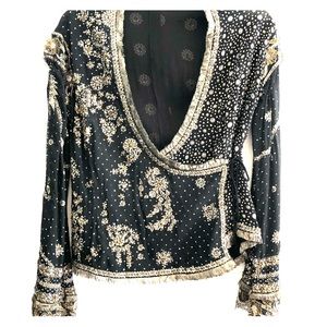 Elegant and ornate wrap cover/top